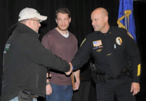 Jim Thiewes Accepting Commendation Award